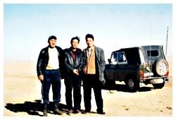 Three very drunken Mongolians who plied us with vodka in the morning before allowing Rory to drive their jeep